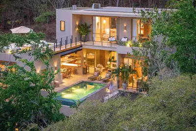 Image de Gated Beachfront Retreat Among Lush Natural Canopies