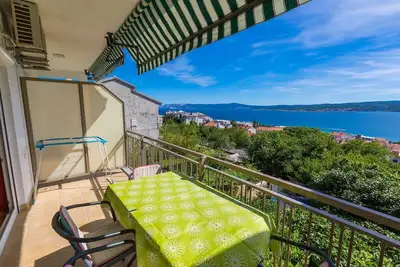Image de Appartement pittoresque à seulement 500 mètres de la plage avec vue sur la mer, barbecue, parking
