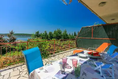 Image de Appartement unique à seulement 200 mètres de la plage de sable avec vue sur la mer, parking, chaises longues, climatisation