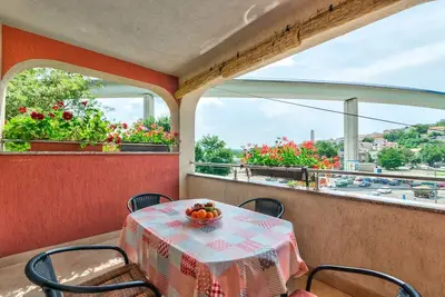 Image de Appartement confortable à seulement 500 mètres de la plage avec parking privé, climatisation, WiFi
