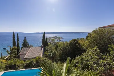 Image de Magnifique appartement à seulement 80 mètres de la plage avec piscine et vue sur la mer