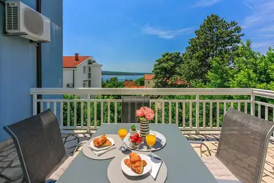Image de Appartement lumineux à seulement 300 mètres de la plage avec vue sur la mer, barbecue, lave-linge