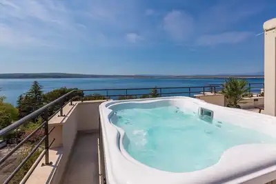 Image de Appartement fascinant à seulement 100 mètres de la plage avec sauna et jacuzzi sur le toit-terrasse