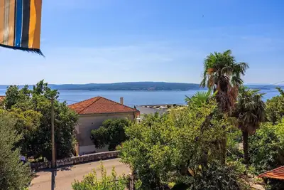 Image de Appartement confortable à seulement 400 mètres de la plage avec vue sur la mer, barbecue, climatisation