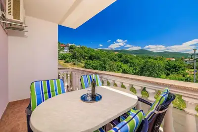 Image de Appartement acceptant les animaux domestiques à seulement 470 mètres de la plage, avec lit bébé et chaise haute