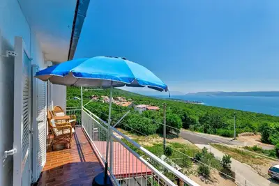 Image de Appartement confortable avec vue imprenable sur la mer, barbecue, lave-linge