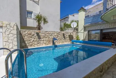 Image de Appartement lumineux à seulement 400 mètres de la plage avec une vue imprenable sur la mer et deux vélos