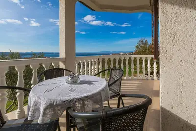 Image de Appartement confortable avec vue sur la mer, jardin, barbecue et parking