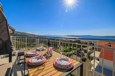 Image de Superbe appartement avec vue imprenable sur la mer, lave-linge, barbecue