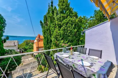 Image de Charmant appartement à seulement 240 mètres de la plage avec vue sur la mer, barbecue, climatisation
