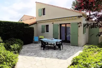 Image de La Palmyre - Lumineuse Villa mitoyenne - jardin clos - Piscine Collective