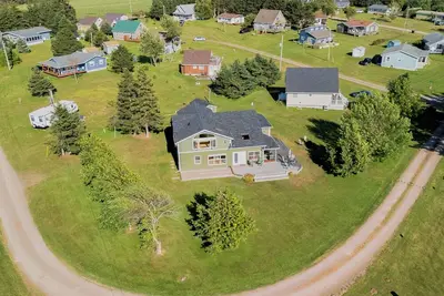 100 steps out front to your red sandy beach!