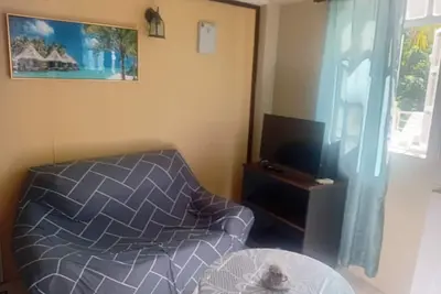 Image de Beautiful 1-bedroom apartment with Ac. Beach five minute walk. Pool access.