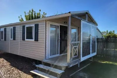 Image de Mobil Home Confort Neuf, 2 chambres, 30 m² avec terrasse couverte et semi-fermée 4 personnes