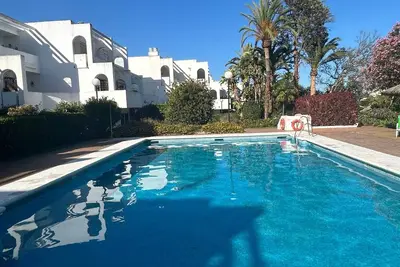 Image de Duplex « Sotogrande » avec piscine commune, terrasse partagée et Wi-Fi