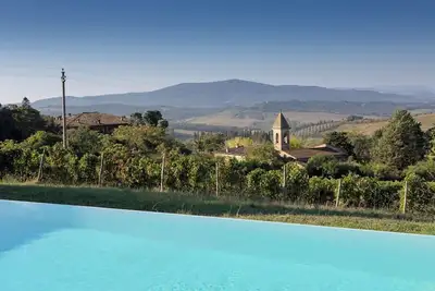 Image de Podere Sangiovese, pool and view in Chianti region