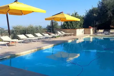 Spacious apartment in villa with swimming pool