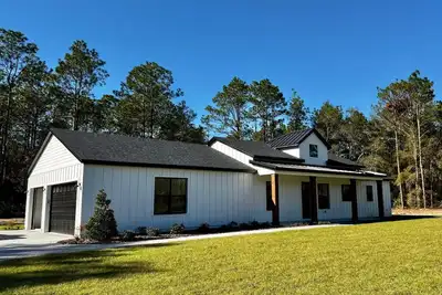 Image de The White Barn Retreat • Minutes from Wec & Springs