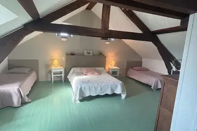 Image de Chambre d’hôtes « Chambre Verte » avec vue montagne, terrasse partagée et Wi-Fi