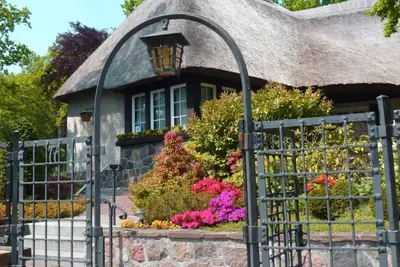 Image de Rügen vacation near the beach - Landhaus Wilkens vacation apartment Sommerwind - Landhaus