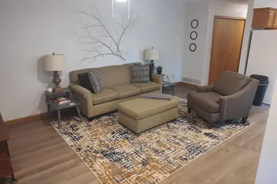 Two - bedroom apartment with deck and firepit.