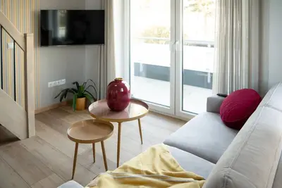 Image de Appartement neuf Sonnengelb à Dangast avec vue mer, cabine infrarouge et grande terrasse privée