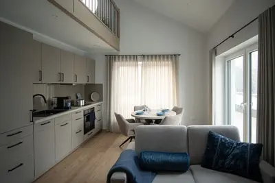 Image de Appartement neuf Wattblick à Dangast avec vue mer, grande terrasse privée et mezzanine