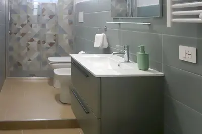 Image de Comfortable apartment for groups adjacent to Naples central station