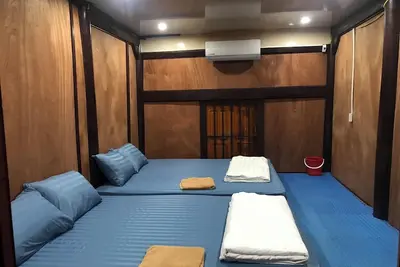 Image de Homestay yên tĩnh với khuân viên xanh, chỉ mất 5 phút đi bộ là tới bãi biển.