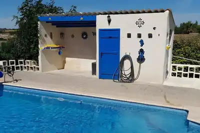 Image de Villa « Charmante Location Vacances » avec piscine partagée, Wi-Fi et climatisation