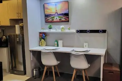 Image de Cozy 1-bedroom condo with Ac in charming Muntinlupa