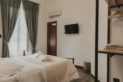 Image de Chambre quadruple « King » avec Wi-Fi et climatisation