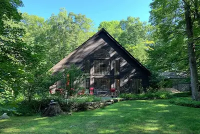 Sun filled cottage in the woods