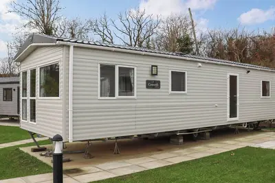 Image de 2 chambres à coucher à Pendine