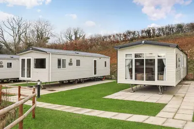 Image de 2 chambres à coucher à Pendine