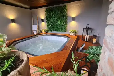 Image de House by the Dobra River with jacuzzi, panoramic terrace, and space for gatherings.