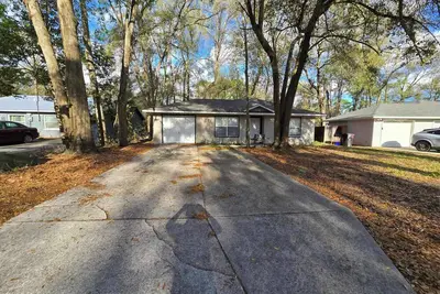 Image de Cozy home nested near Haile and Butlers Plaza