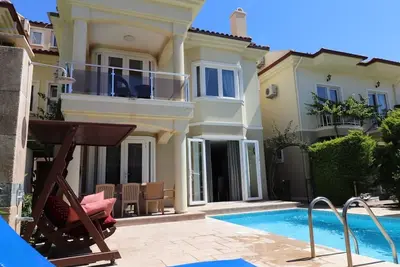 Image de This 4 bedroom villa to rent in Fethiye has got its own private pool and garden.