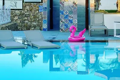 Image de Wohnung Glicine mit Schwimmbad und Meerblick by Interhome