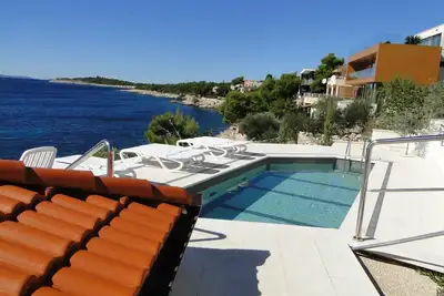 Image de Villa Perla Superior Wohnung für 5 Personen by Interhome