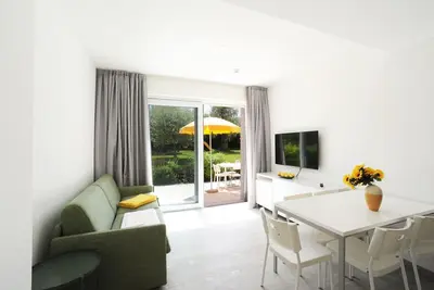 Image de Dreizimmerwohnung mit direktem Zugang zum Garten by Interhome