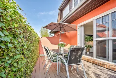 Image de Maison de vacances 'Haus Windflüchter 3b' avec terrasse, jardin privés et Wi-Fi