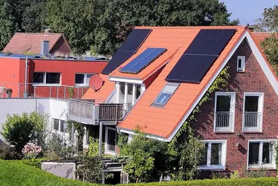 Image de Modern, well-equipped vacation apartment with roof terrace directly on the dyke.