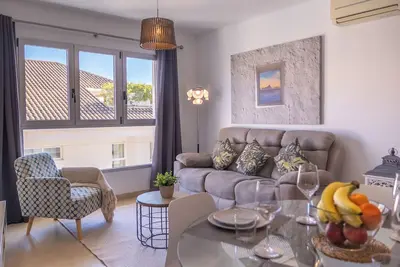 Centrally located, modern, with private parking and an elevator