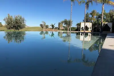 Image de Villa de luxe à Amelkis Marrakech 7 suites piscine hammam cinéma vue golf Atlas