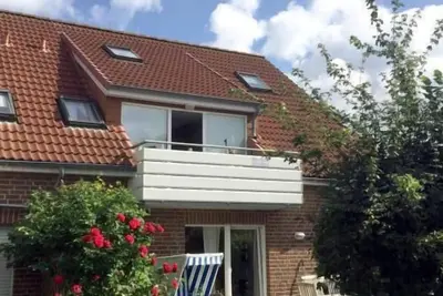 Image de Cozy apartment on the 1st floor with southwest-facing balcony, close to the beach and the center.