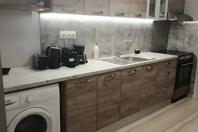 Image de Appartement « Alexandra’s Cozy Apt » avec balcon, Wi-Fi et climatisation