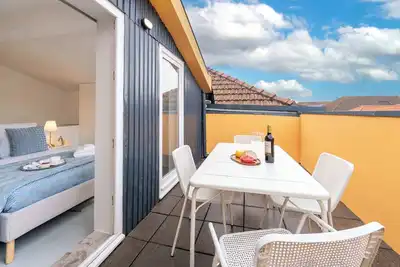 Image de Bright & Spacious Flat with Terrace by HostWise