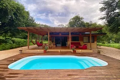 Image de Casa Sol y luna \nHouse located in an organic farm with horses 5 min to the beach