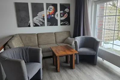 Image de Mühle vacation apartment in Wangerland with garden, terrace and modern furnishings